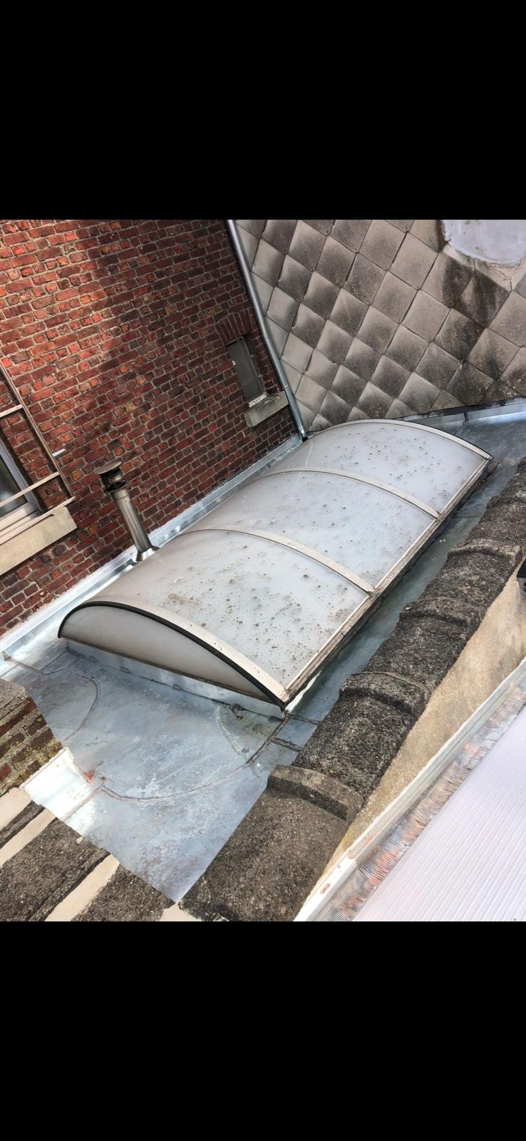 Toiture arrondie en zinc rénovée